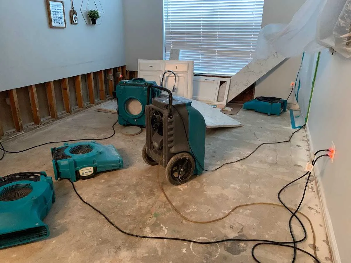 Dehumidifier in flood-cut room for Water Damage Restoration in San Luis